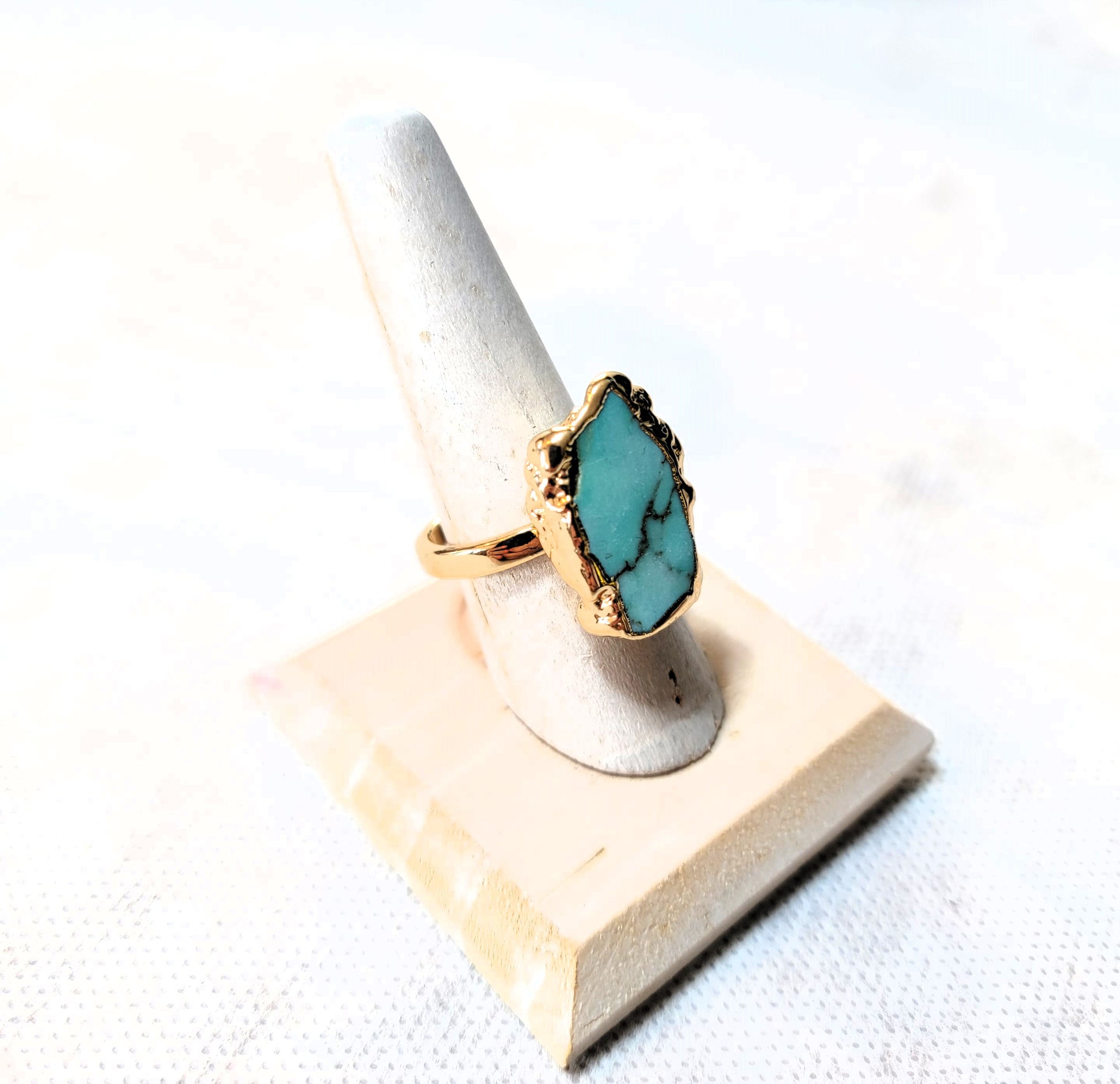 Raw Turquoise Stone in Gold Setting